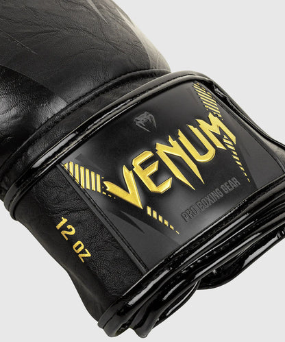 Gants de boxe Venum Impact – Noir/Or